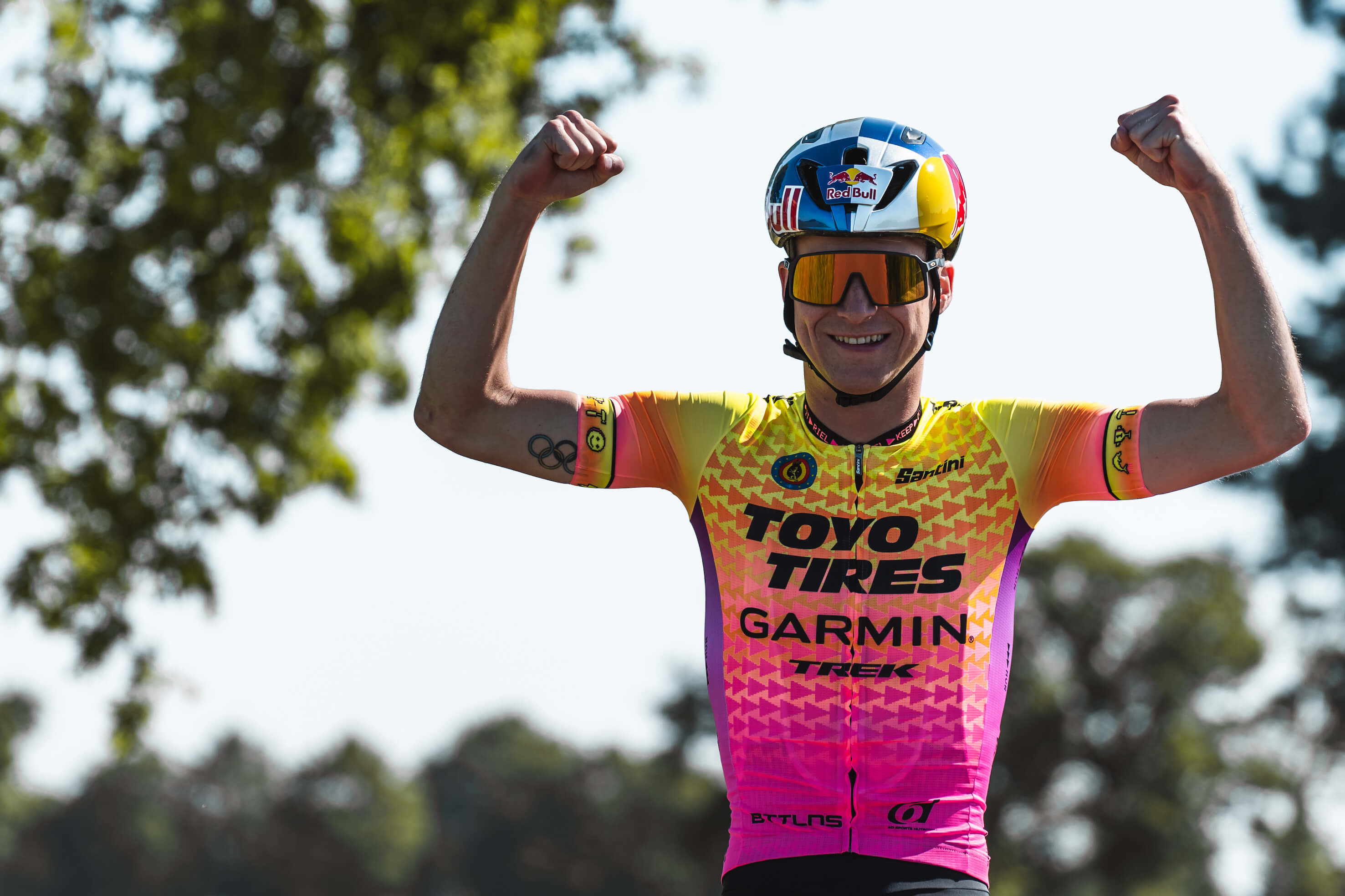 Triathlete Marten Van Riel in a power pose. 
