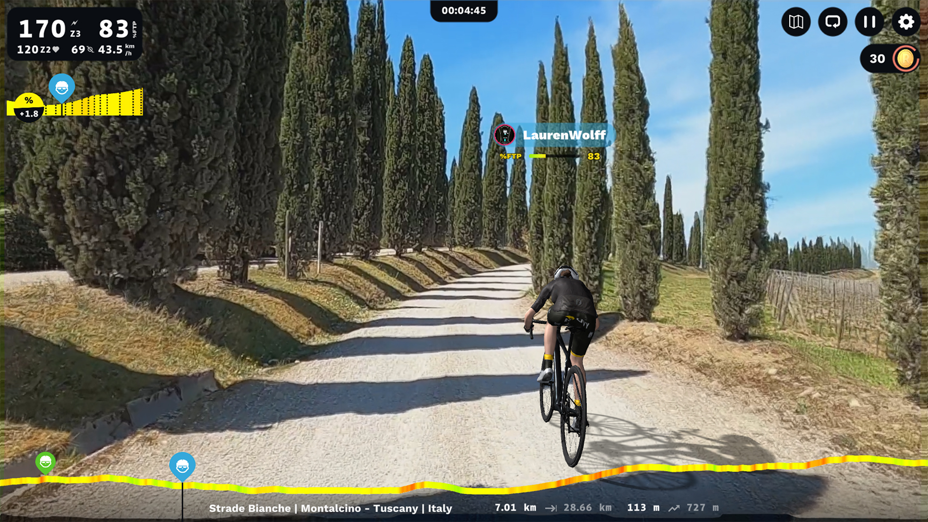 Riding over the gravel hills in Tuscany on the Strade Bianche course on ROUVY