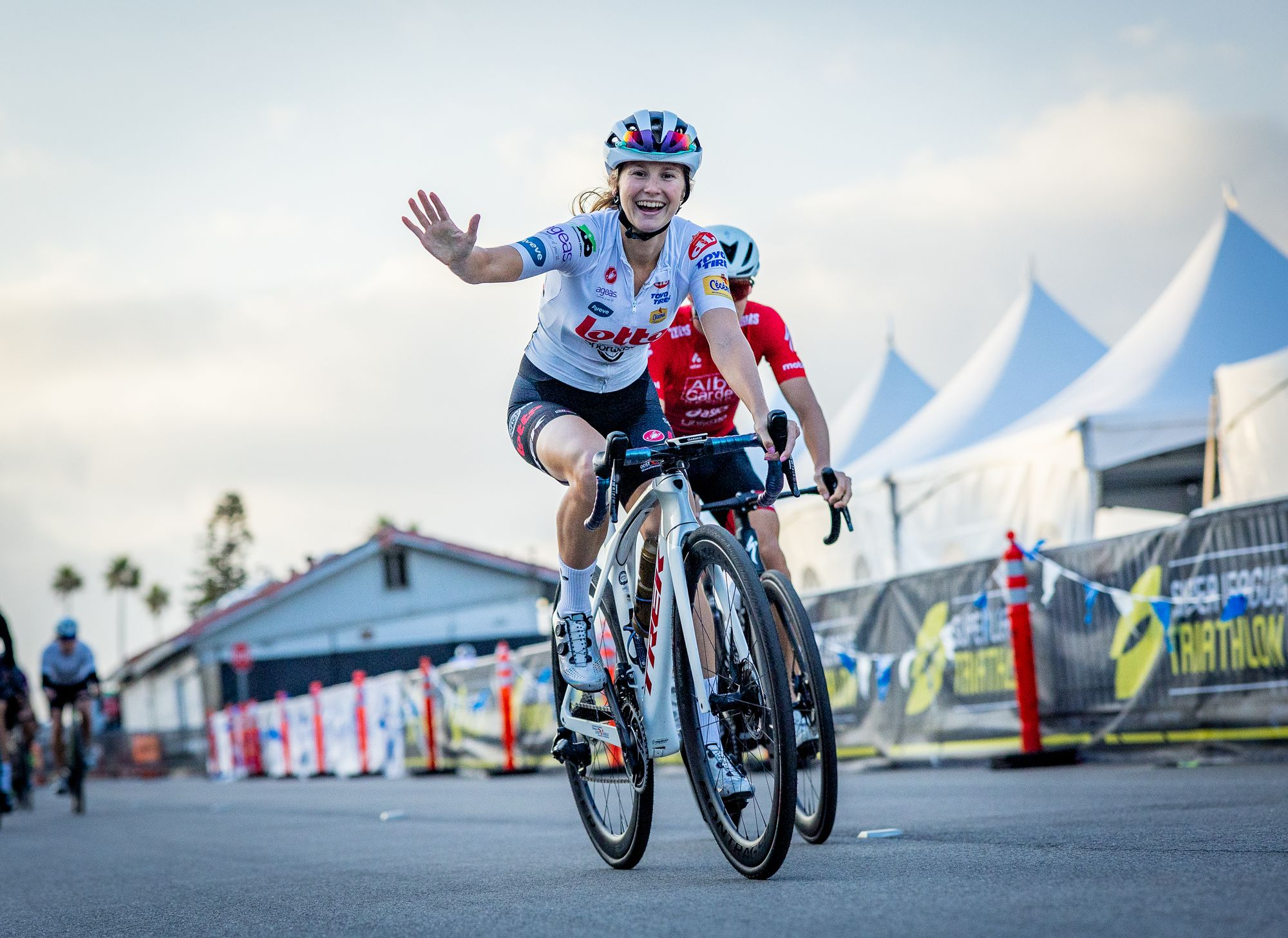 ROUVY Ambassador Hanne de Vet waving and smiling while riding her Trek bike